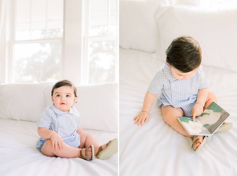 toddler reading book in cute blue gingham outfit