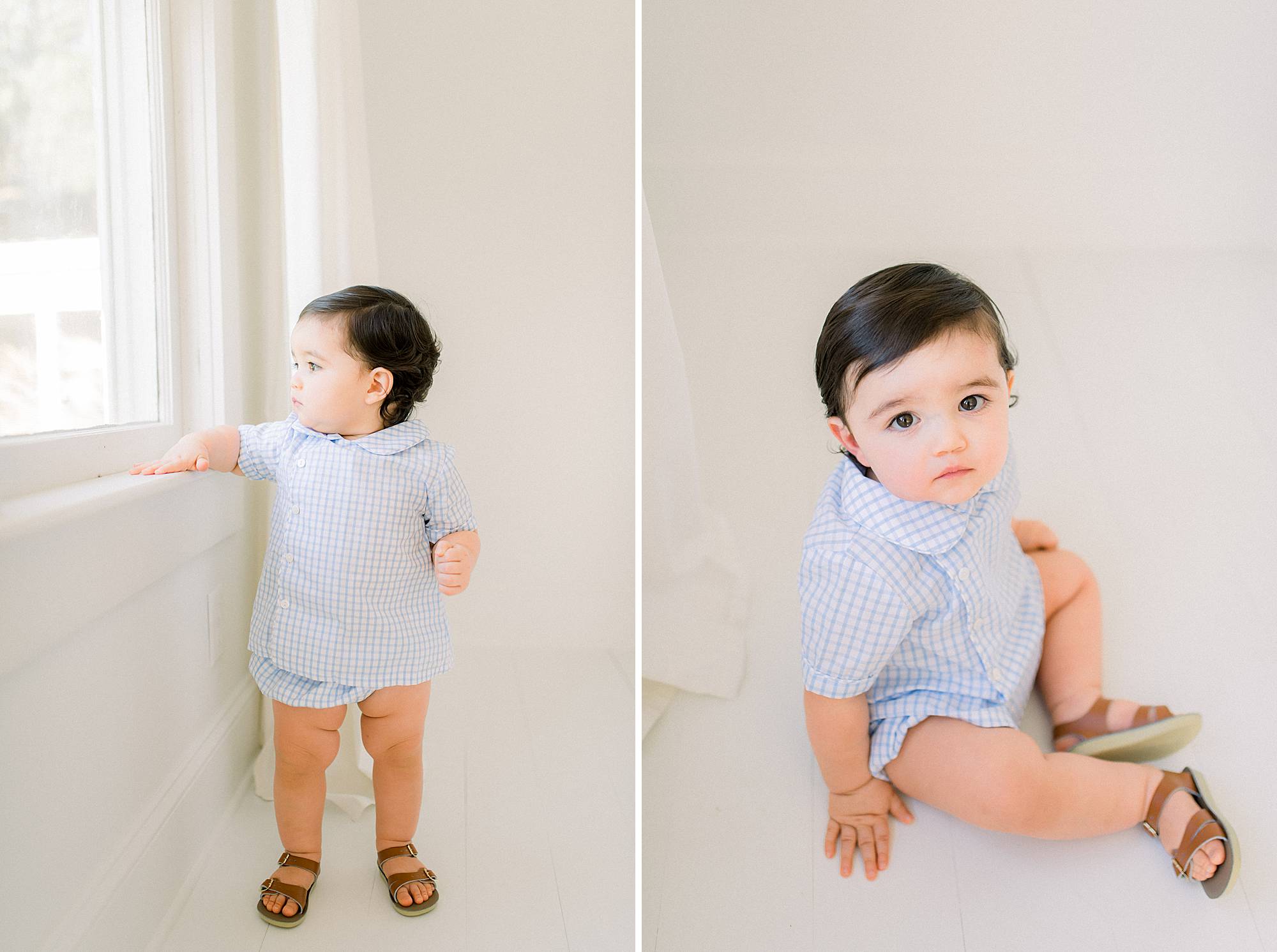 child looking out of window in bubble outfit