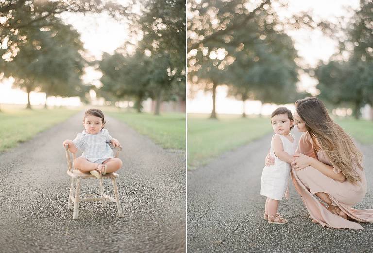 baby in antique chair in a field