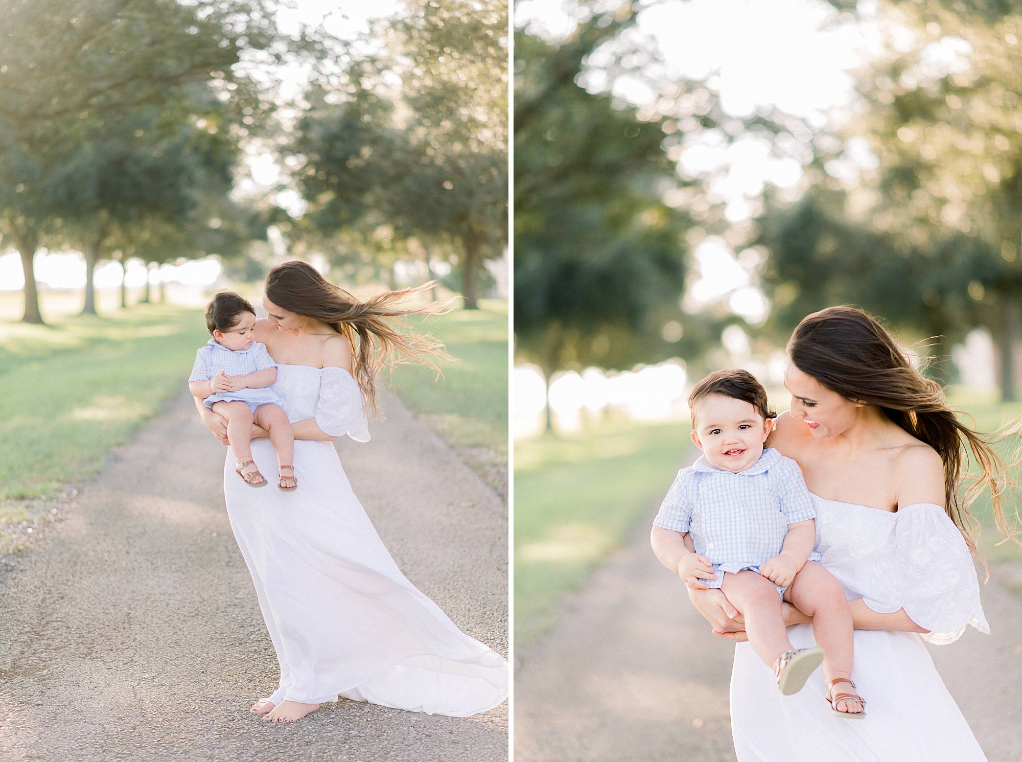 mom holds her toddler for a portait at sunset