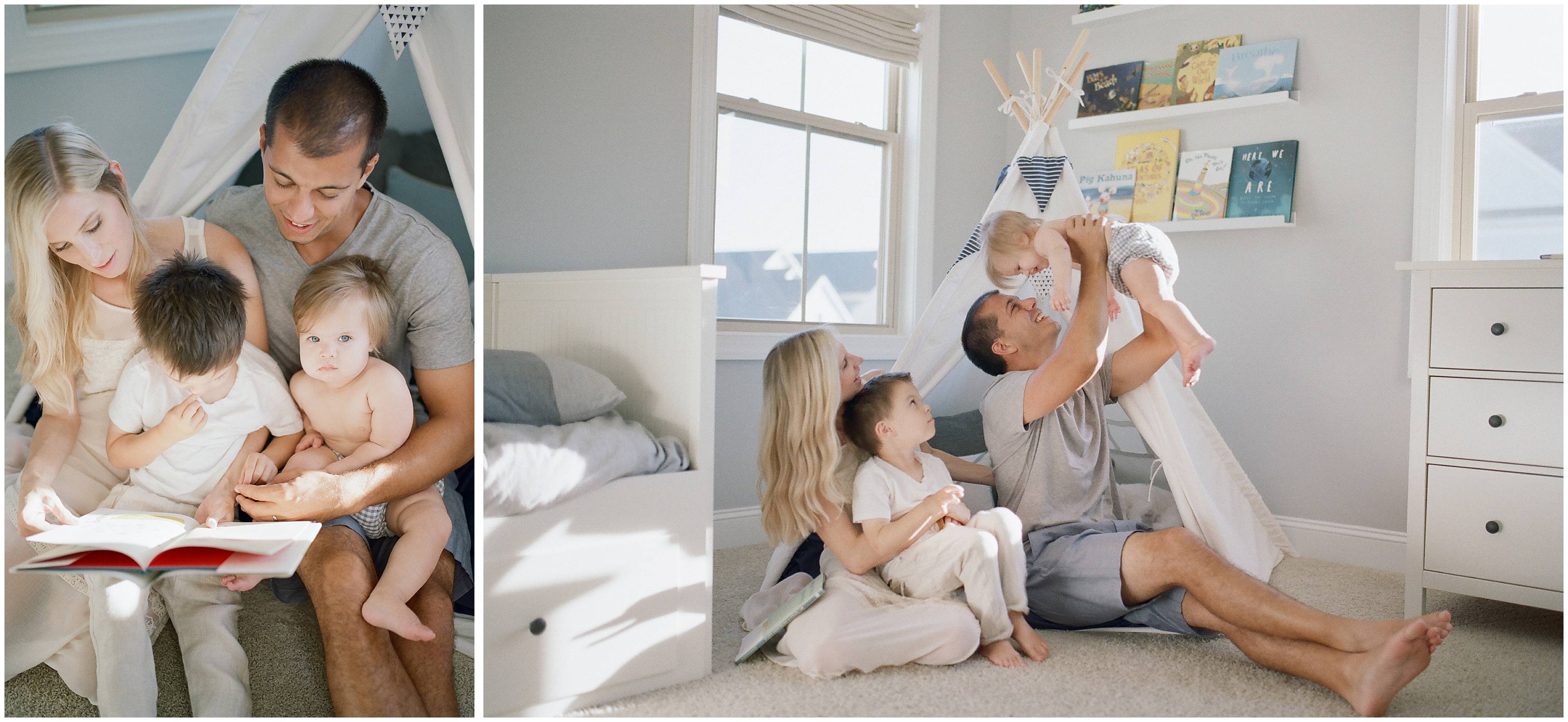 dad holding baby above head shot indoors in tent on 35mm film