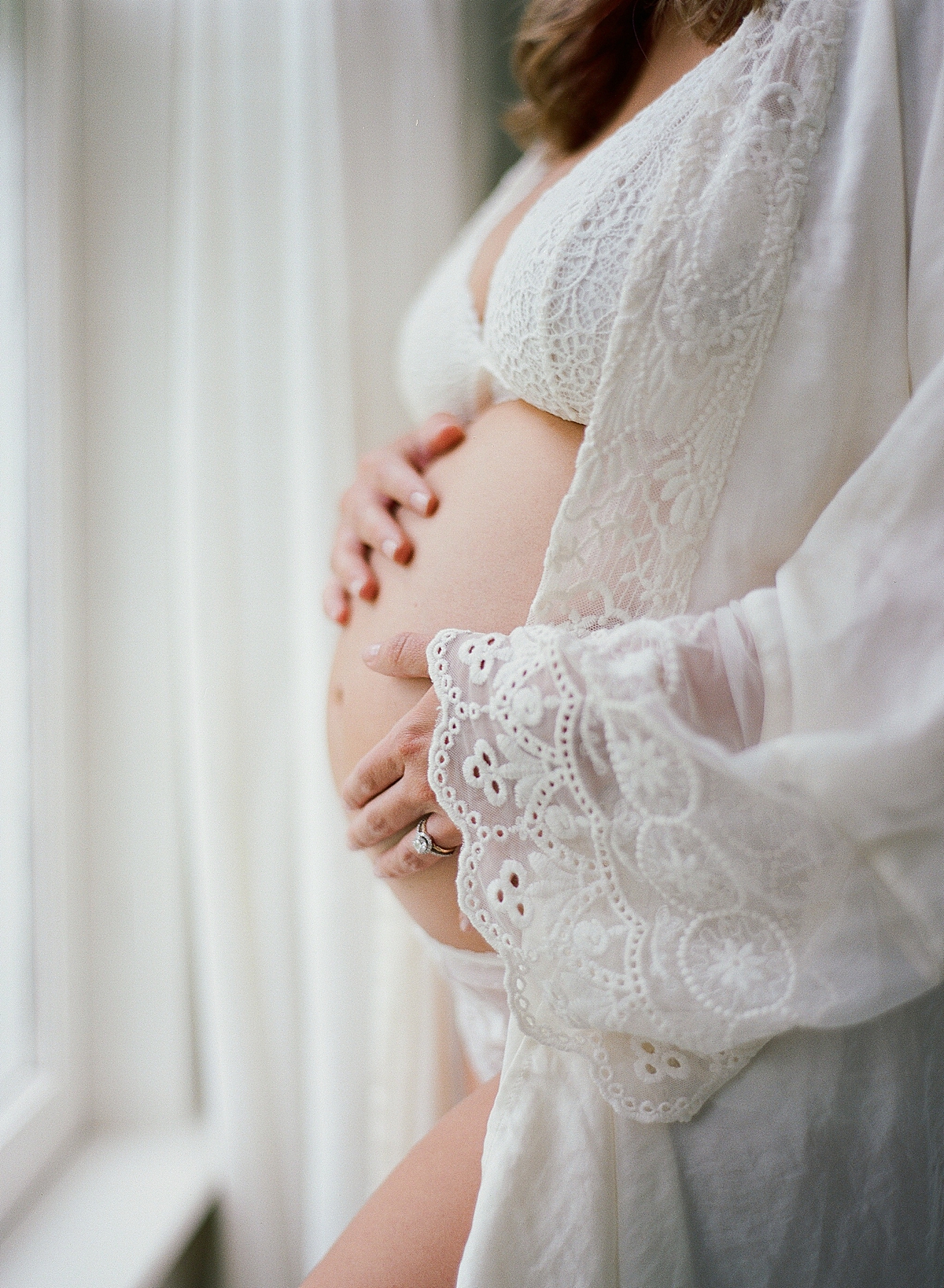 maternity boudoir photos shot on medium format film in photography studio 