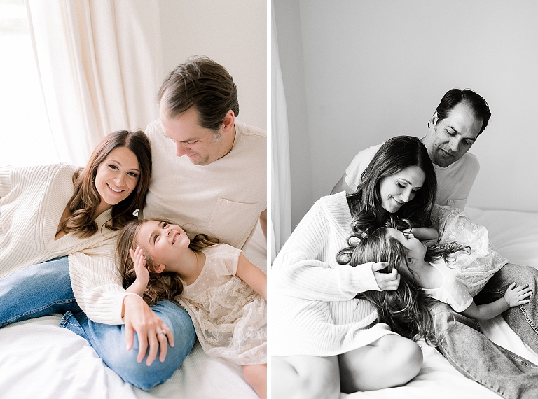 parents snuggle with their little girl as they have a maternity session photographed in studio
