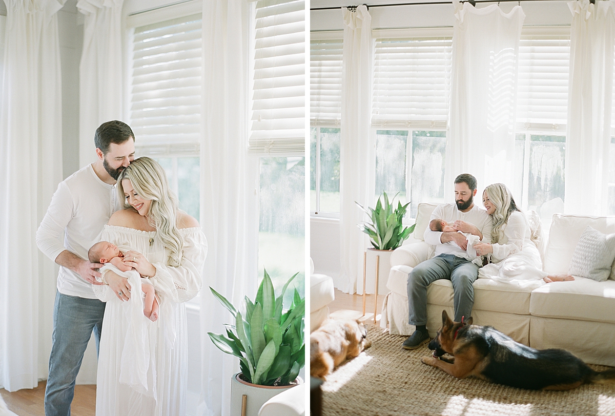 parents happily gaze at their newborn baby boy as they have had many miscarriages leading up to finally holding this baby