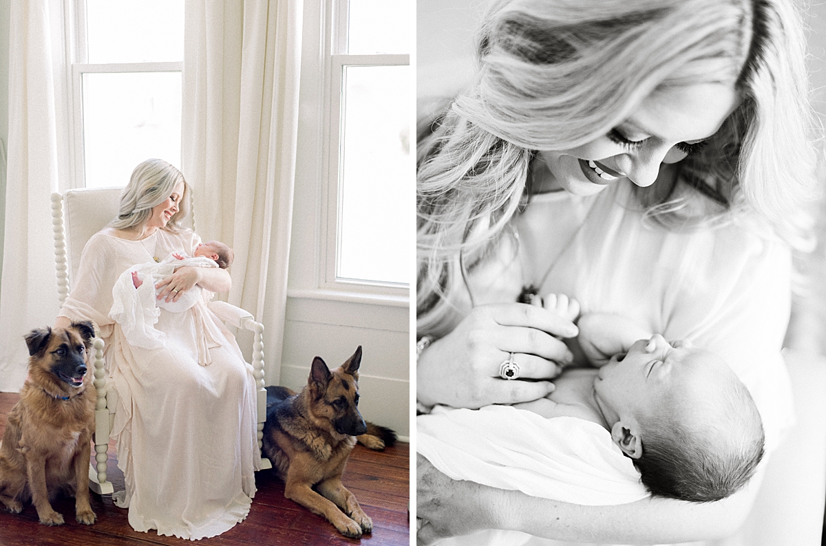 mother in newborn nursery rocking her infant and watching her dogs play inside while getting photographed for her lifestyle session