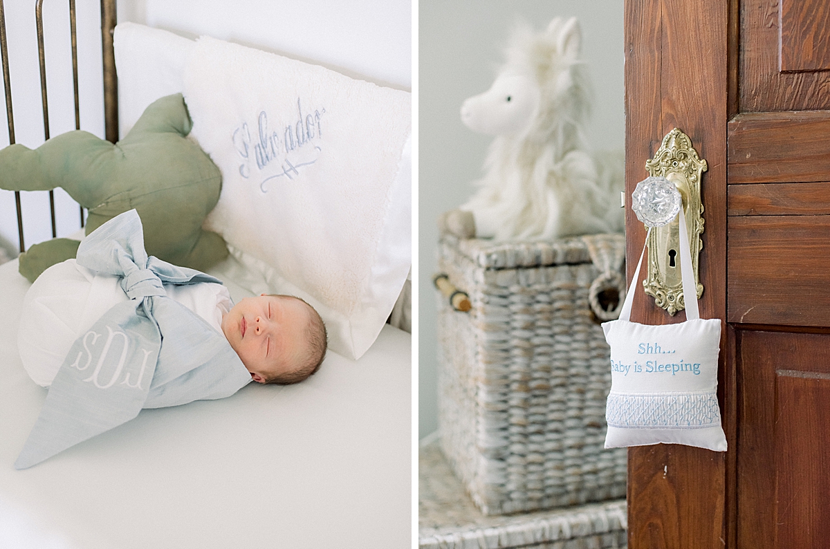 newborn baby boy sleeps in his crib, a sign on the door of the nursery says shh...baby is sleeping