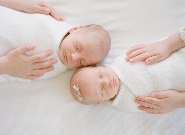 newborn twin boy girl portraits in natural light newborns studio taken on Contax 645 medium format film  Portra 800 colors are warm soft and capture newborn skin accurately