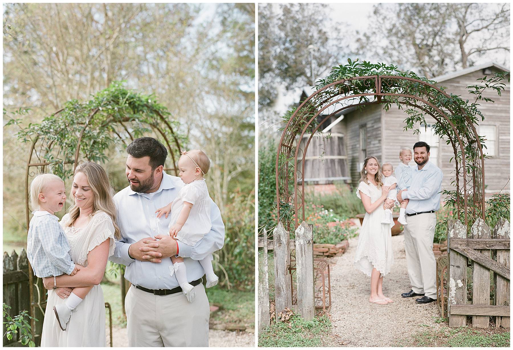 Parents holding their children under the arch way while smiling for a family photo. 